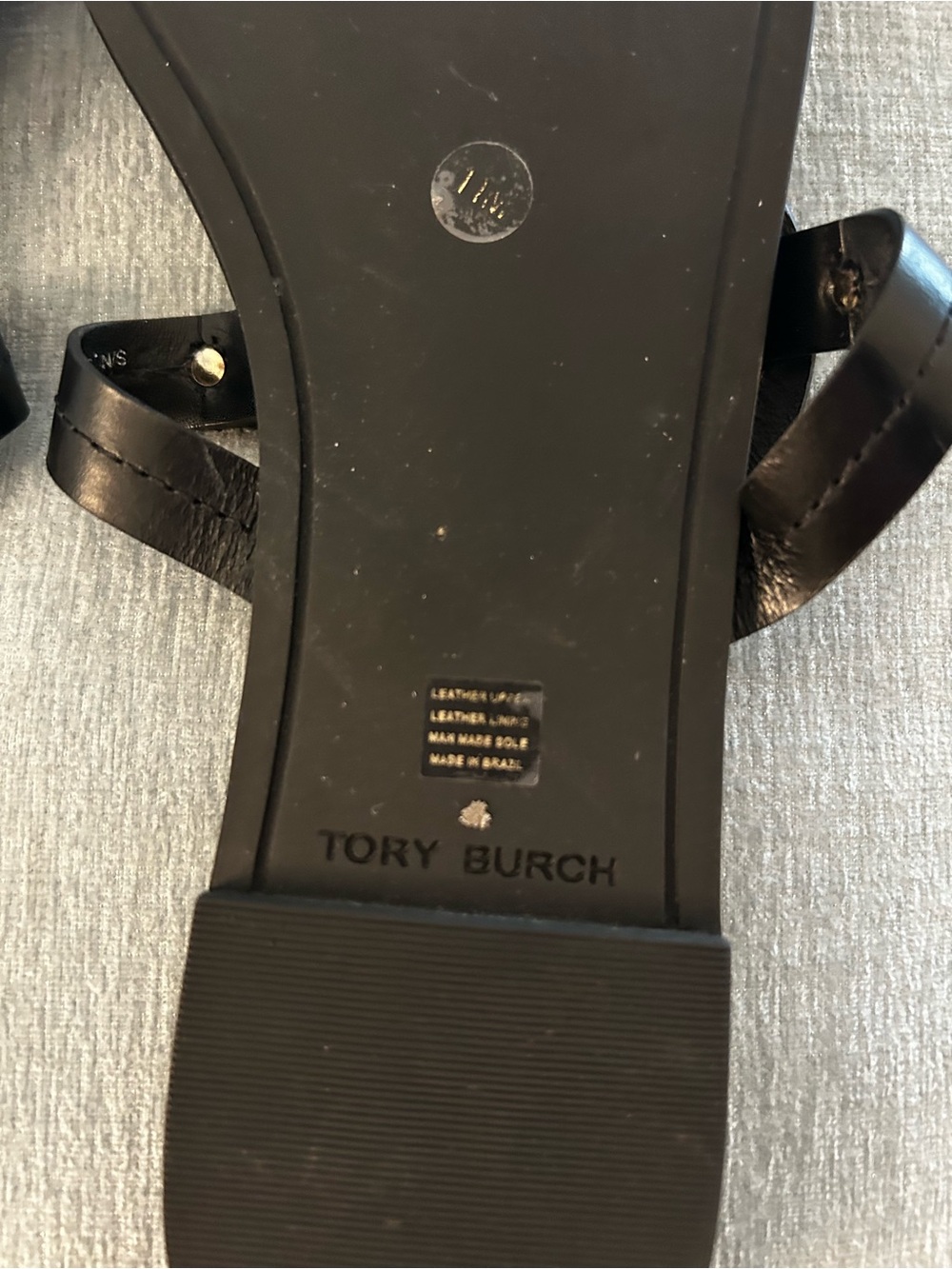 Tory Burch Black Leather Logo Cutout Thong Sandals with Gold Accents. - Picture 5 of 8